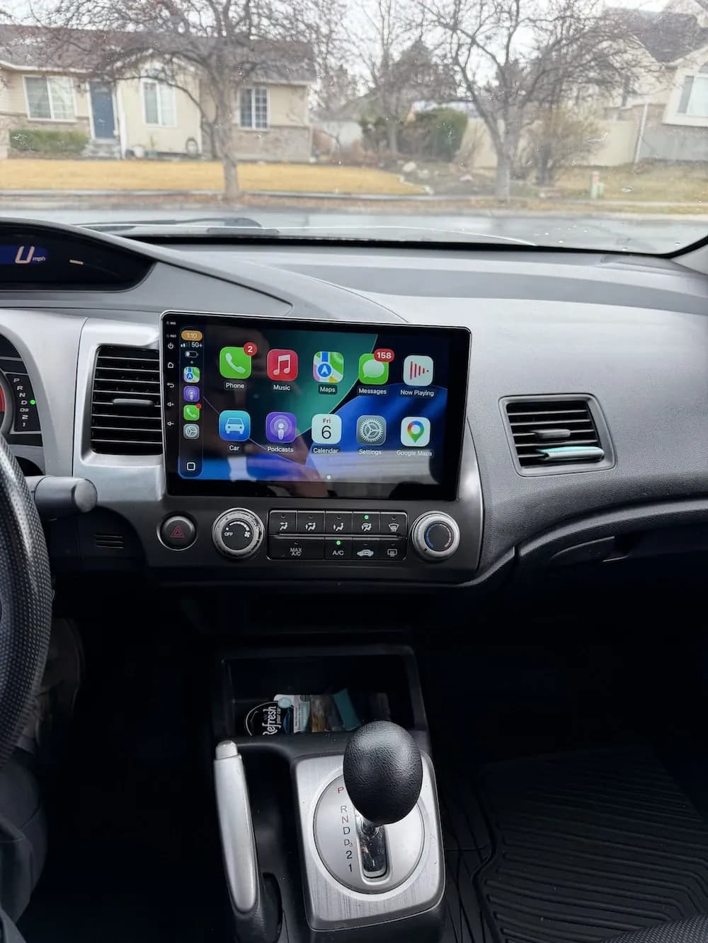 Real Current Auto Tech installation showing Apple CarPlay in a vehicle dashboard