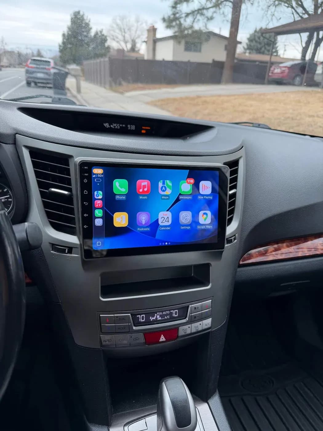 Touchscreen radio installed in the center of a vehicle dashboard